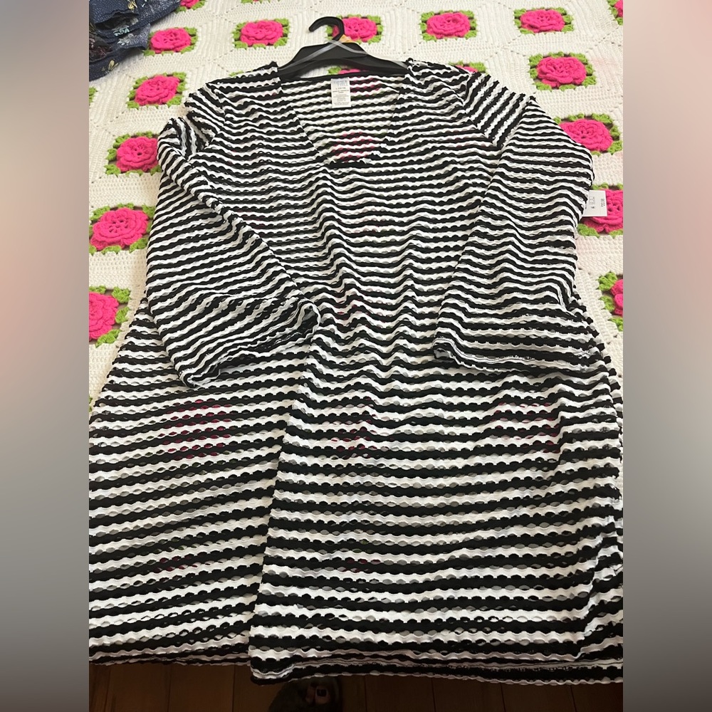 Black and White Striped coverup or can be worn over a tank top.